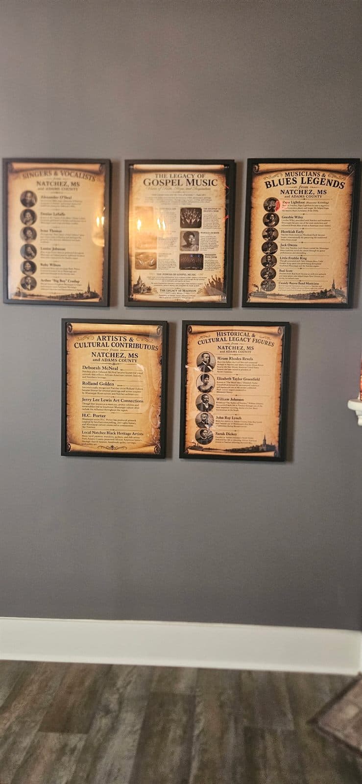 A grouping of framed historical documents on display.